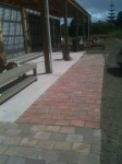 Paving extended along verandah